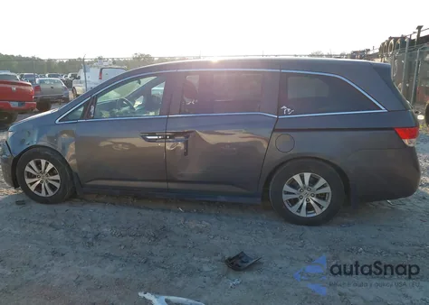 2016 Honda Odyssey Se z USA, uszkodzony, nr VIN 5FNRL5H3XGB090117